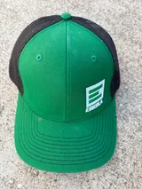Retired green Eskola hat
